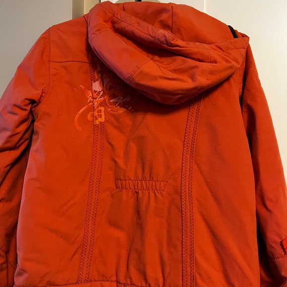 Obermeyer ski jacket in orange with brown lining. Lots of pockets, zipper front. - Picture 4 of 4